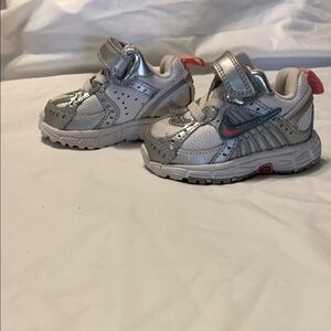 Nike Silver Sneakers with Velcro Closure and Textured Soles